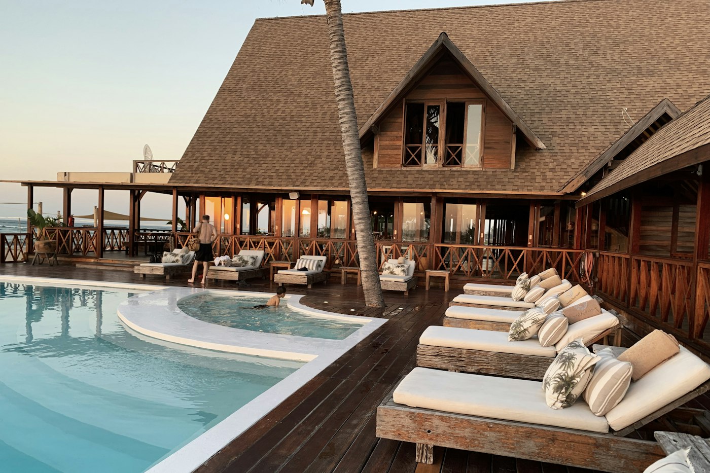Hotel with pool at dusk