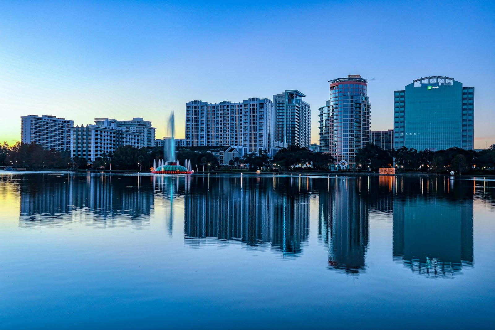 Sunrise over Lake Eola park and the downtown Orlando skyline, Florida